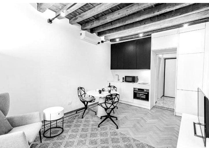 Casa Asnago e Vender — soggiorno con cucina e zona pranzo