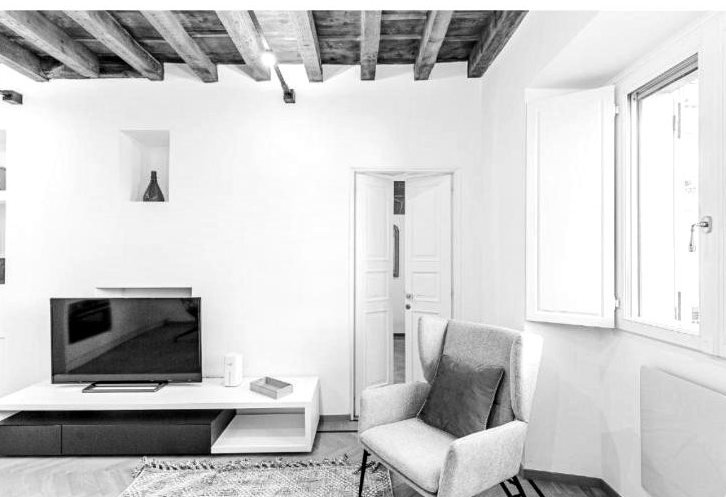Casa Asnago e Vender — poltrona e nicchia con TV