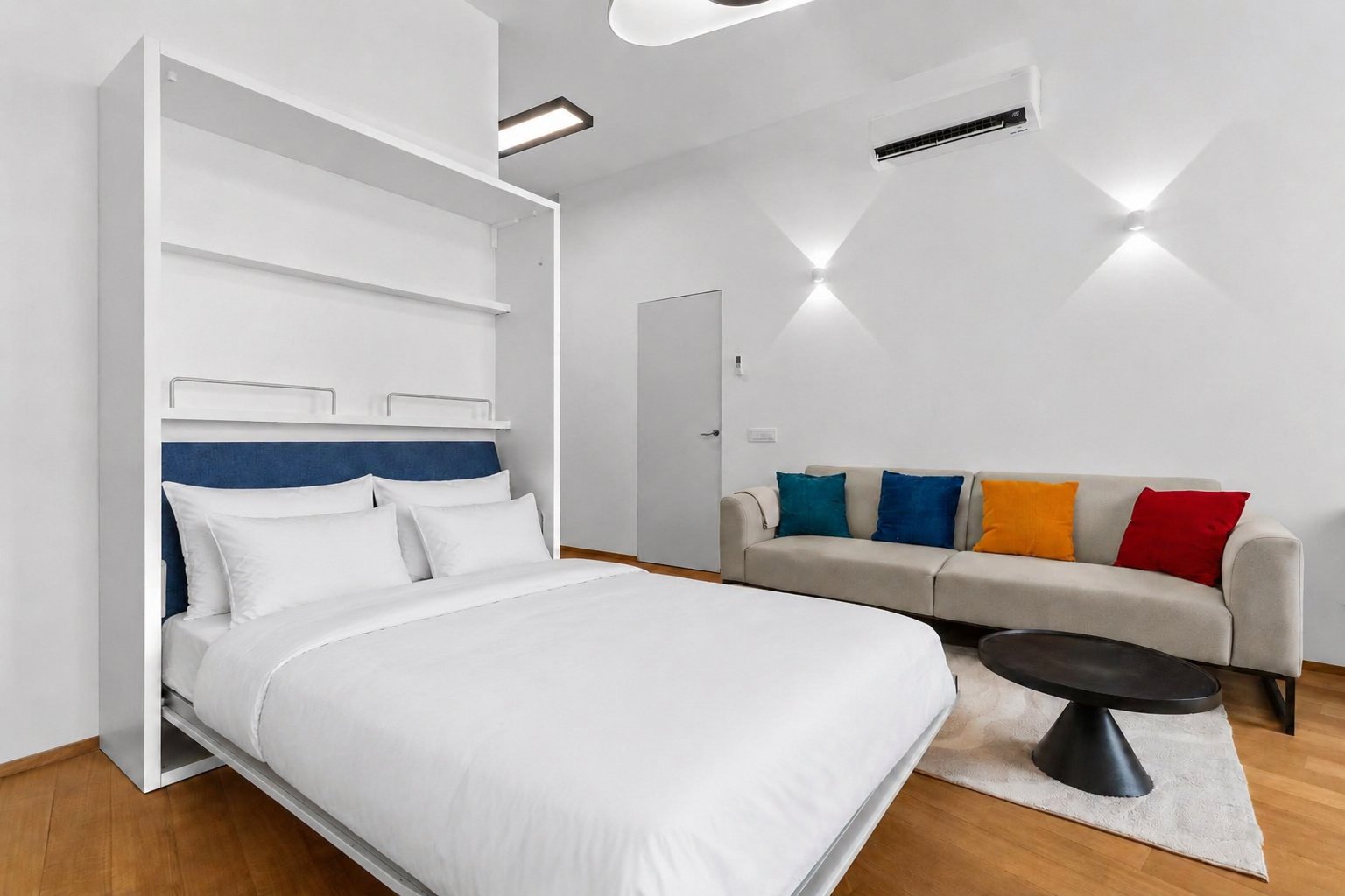 Casa Figini Pollini — letto a scomparsa aperto accanto al divano